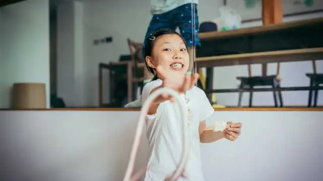 A child playing with a snake in a dream