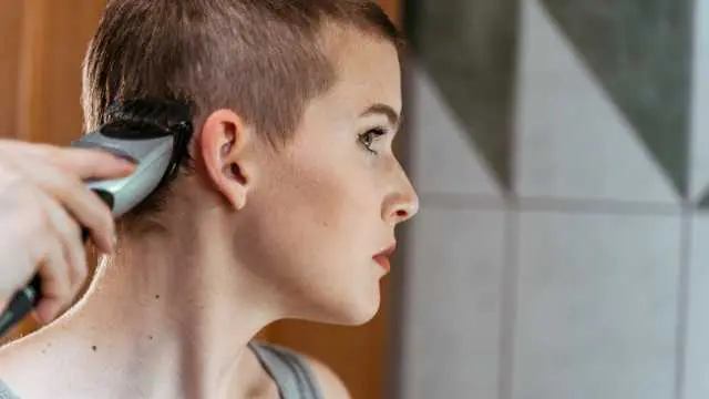 Seeing your hair being shaved in a dream