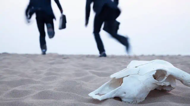 Someone chasing men away from you in a dream